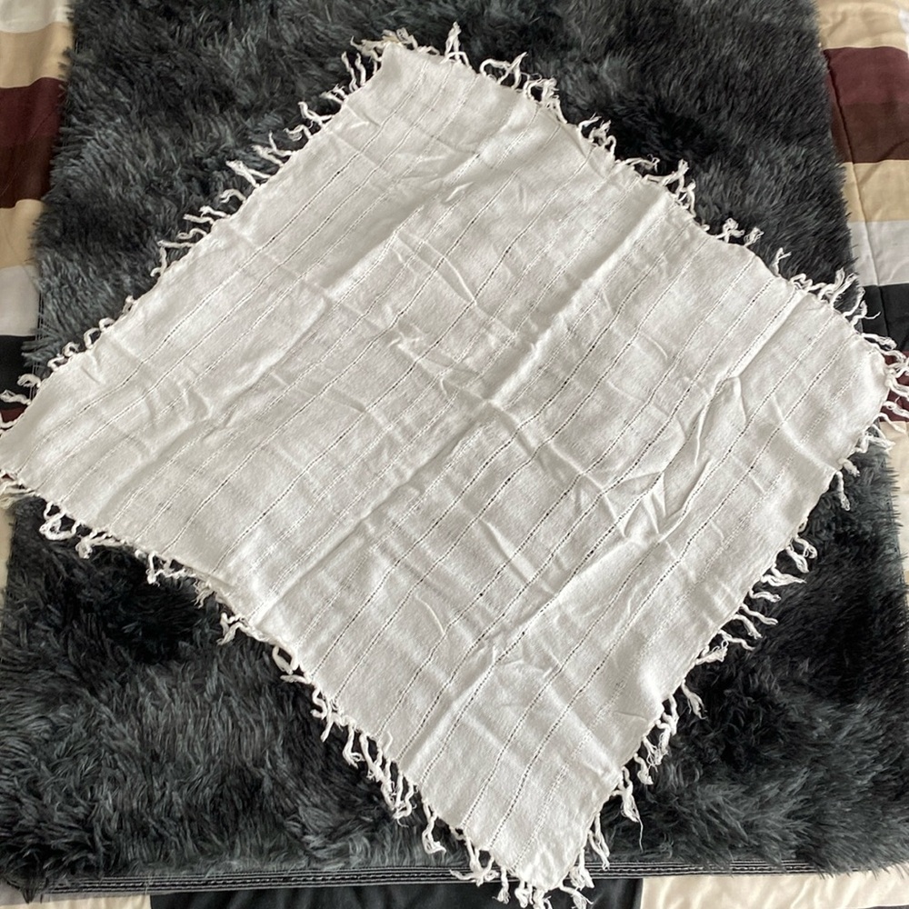 White fringe knit wrap?
